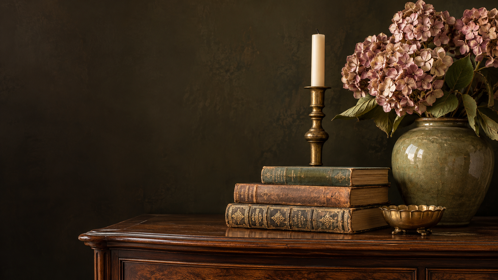 Vintage flowers, brass details, and a stack of old books